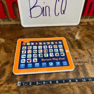 Kids learning tablet player numbers and letters